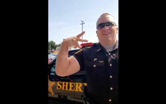Officers Threaten To Throw A Man In Jail For Throwing Up The Peace Sign! "Throw Me Some Gang Signs"