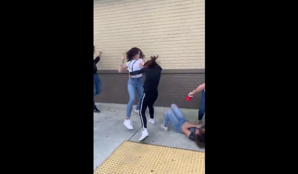 Sheesh: Shorty Got Hit With A "This Is Sparta" Kick During A Fight Outside Of A Fast Food Joint!