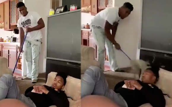 Why He Do Him Like That? Dude Slaps His Friend With A Mop While He Was Sleeping!