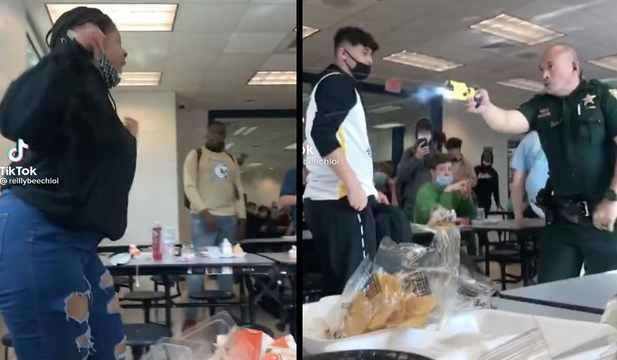 SMH: Female Student Gets Tased By Officer After Heated Dispute!