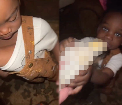 Hold Up, What's Going On Here? Wait Until You See What This Mother Pulls Outta Her Son’s Clothes! [8 Sec] 